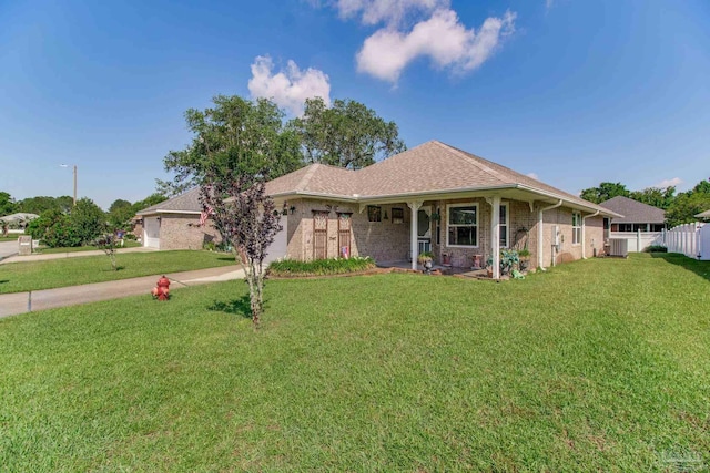 3881 Windsor Castle Blvd, Milton, FL 32583 - ranch-style home featuring an attached garage, brick siding, a shingled roof, driveway, and cooling unit