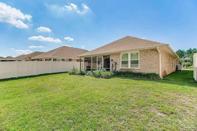 3881 Windsor Castle Blvd, Milton, FL 32583 - back of house with brick siding and a sunroom