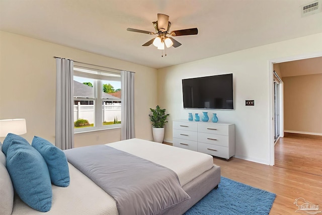 3881 Windsor Castle Blvd, Milton, FL 32583 - bedroom featuring light wood-style flooring and a ceiling fan