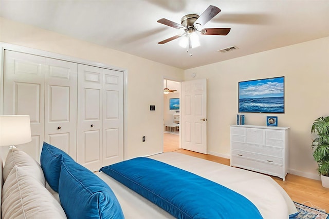 3881 Windsor Castle Blvd, Milton, FL 32583 - bedroom with light wood-style flooring, a closet, and ceiling fan