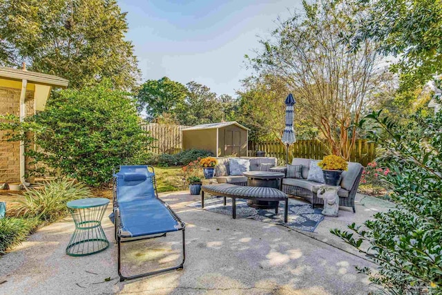 view of patio / terrace featuring an outdoor living space and a shed