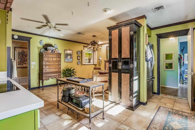 kitchen with ceiling fan with notable chandelier, stainless steel refrigerator, hanging light fixtures, and ornamental molding