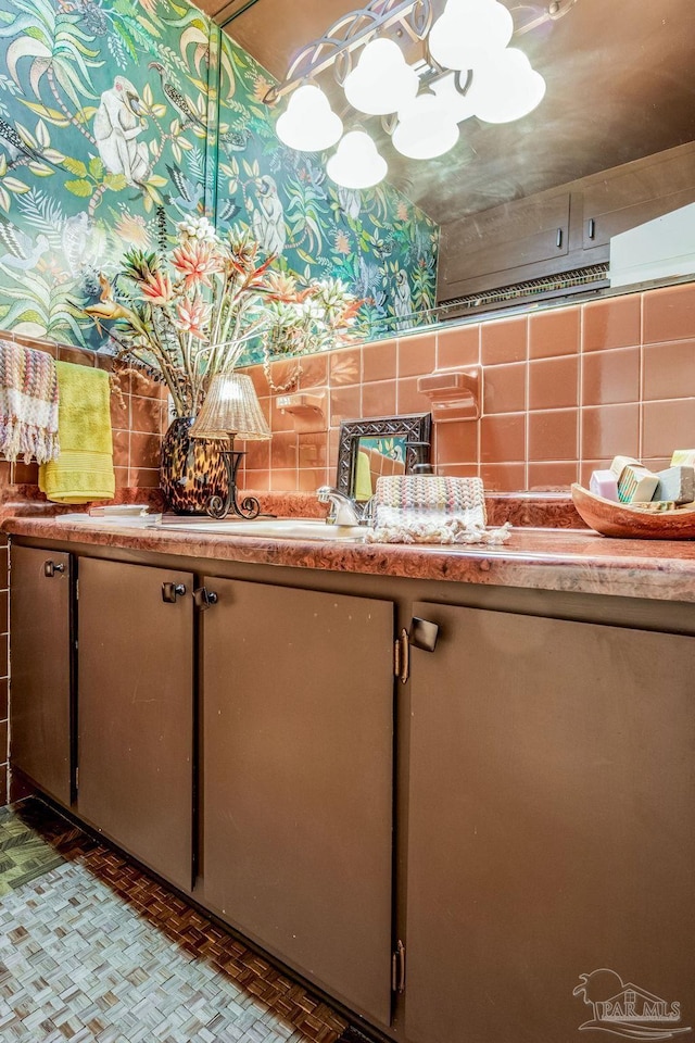 bathroom featuring tasteful backsplash