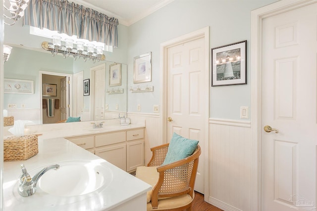 bathroom with vanity and crown molding