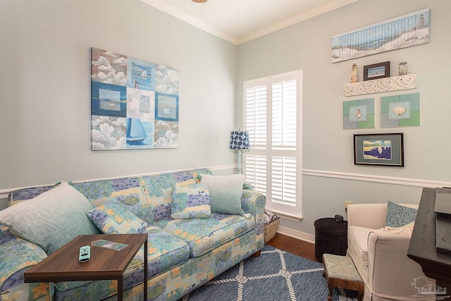 living room with ornamental molding, plenty of natural light, and wood-type flooring