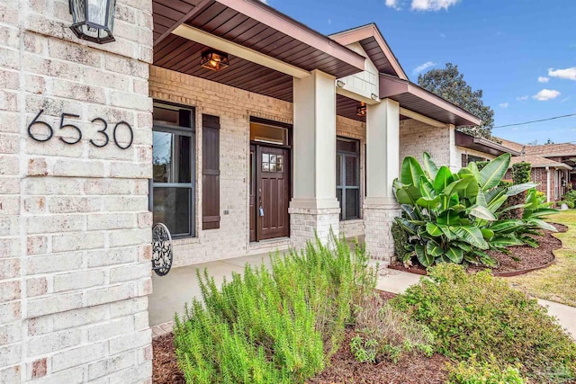 entrance to property with a porch