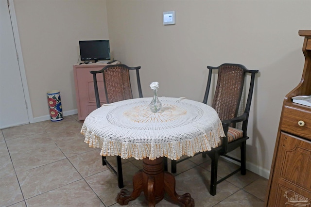 6150 Forest Pines Dr, Pensacola, FL 32526 - dining space featuring light tile patterned floors and baseboards