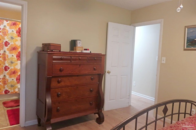 6150 Forest Pines Dr, Pensacola, FL 32526 - bedroom with light wood-style flooring and baseboards