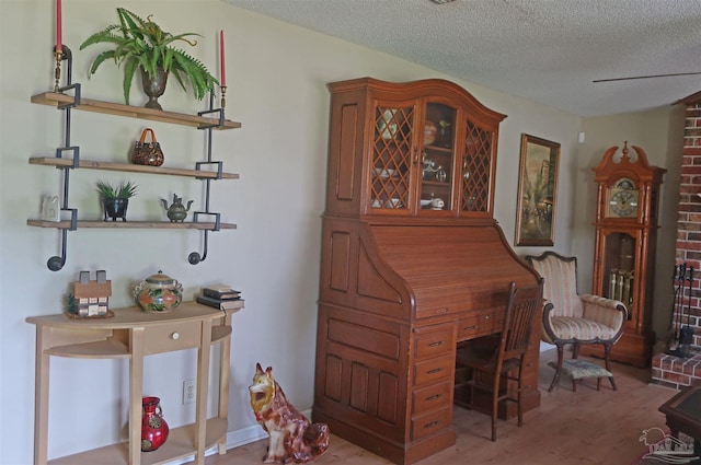 6150 Forest Pines Dr, Pensacola, FL 32526 - office space with a textured ceiling and wood finished floors