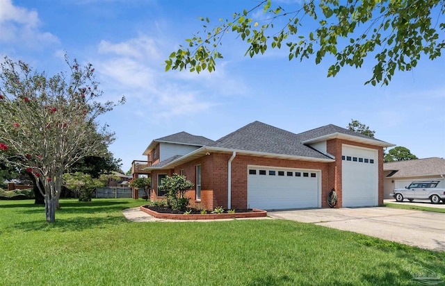 view of front facade with a garage and a front yard