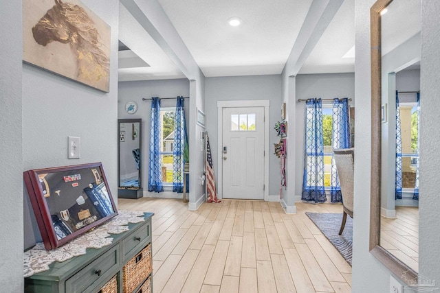 foyer entrance featuring a textured ceiling