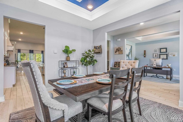 dining area with light wood-type flooring