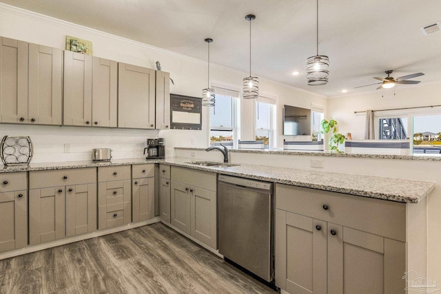 kitchen featuring light stone countertops, dishwasher, a wealth of natural light, and dark hardwood / wood-style floors