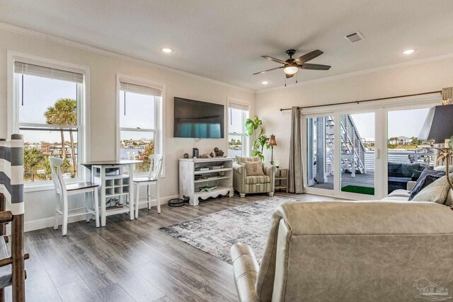 17290 Perdido Key Dr Unit A1, Pensacola, FL 32507 - living area with a ceiling fan, a wealth of natural light, crown molding, and visible vents