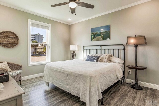 17290 Perdido Key Dr Unit A1, Pensacola, FL 32507 - bedroom featuring ceiling fan, baseboards, ornamental molding, and wood finished floors