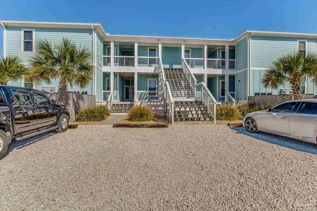 17290 Perdido Key Dr Unit A1, Pensacola, FL 32507 - view of property featuring stairway