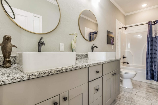 full bathroom with toilet, crown molding, shower / bath combo, and vanity