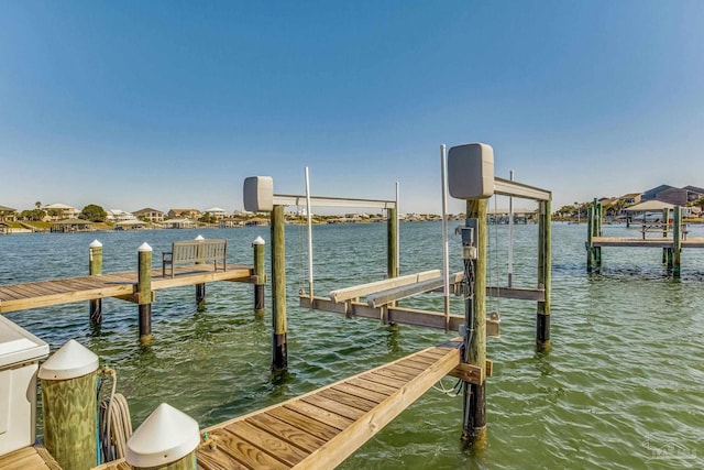 view of dock with a water view