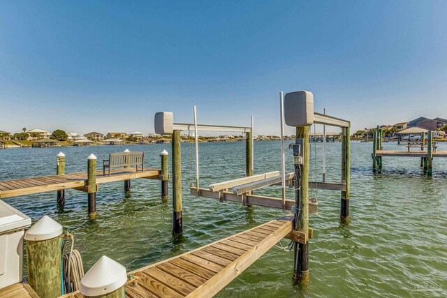 17290 Perdido Key Dr Unit A1, Pensacola, FL 32507 - dock area with a water view and boat lift
