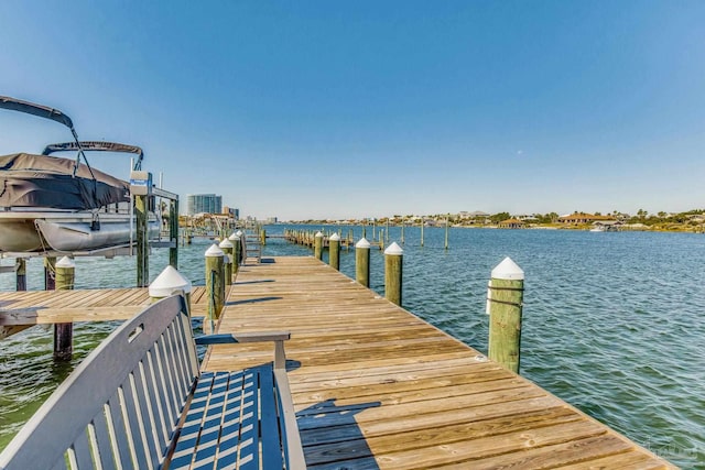 dock area featuring a water view