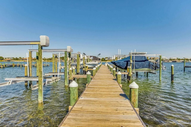 view of dock with a water view