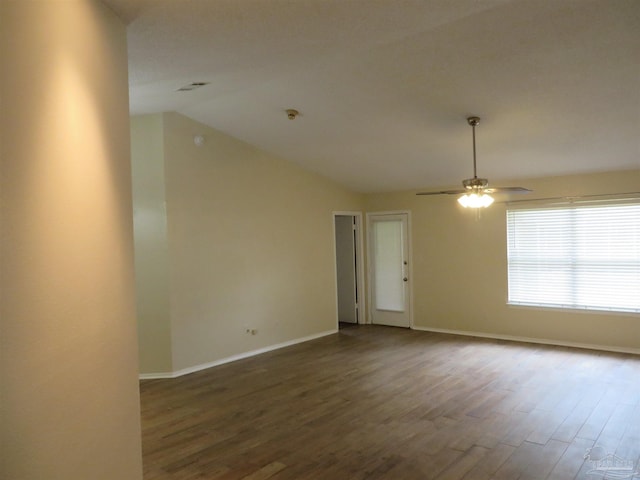 spare room featuring lofted ceiling, ceiling fan, and hardwood / wood-style flooring