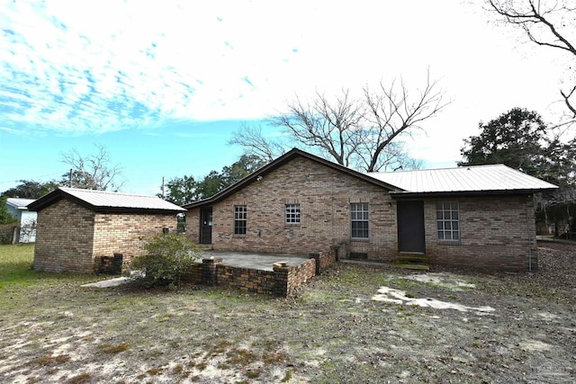 back of house featuring a patio