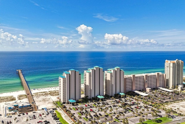 bird's eye view with a beach view and a water view