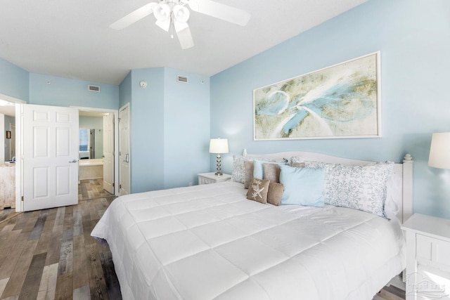 bedroom with ceiling fan, wood-type flooring, and connected bathroom