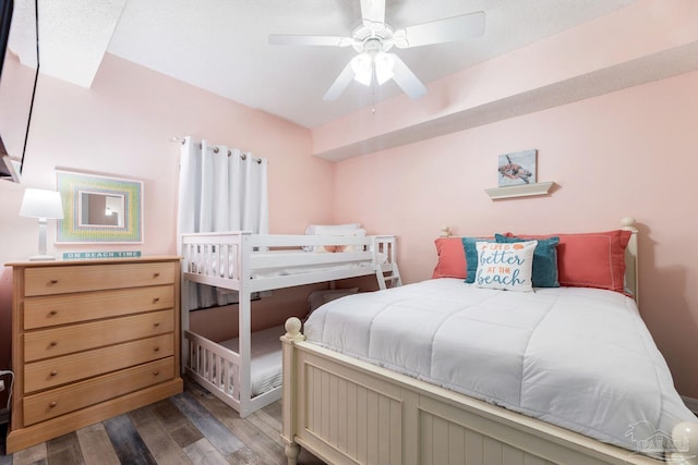 bedroom with hardwood / wood-style flooring and ceiling fan