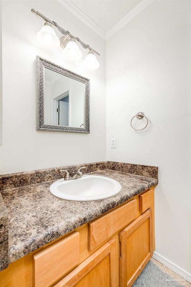 bathroom with vanity and crown molding