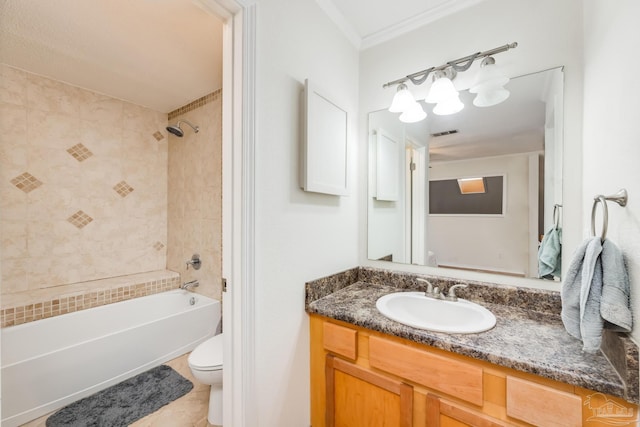 full bathroom featuring tile patterned floors, vanity, crown molding, toilet, and tiled shower / bath