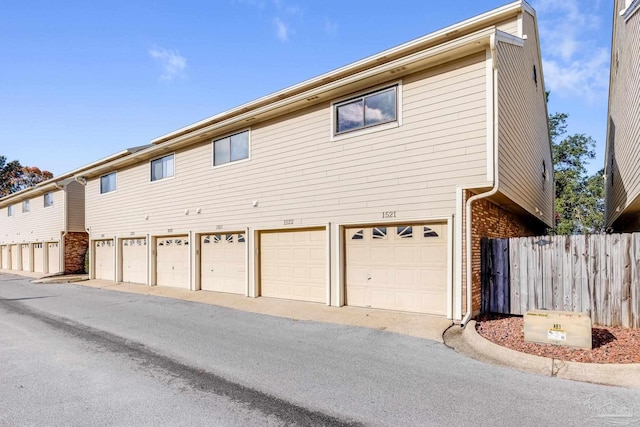 view of side of property featuring a garage