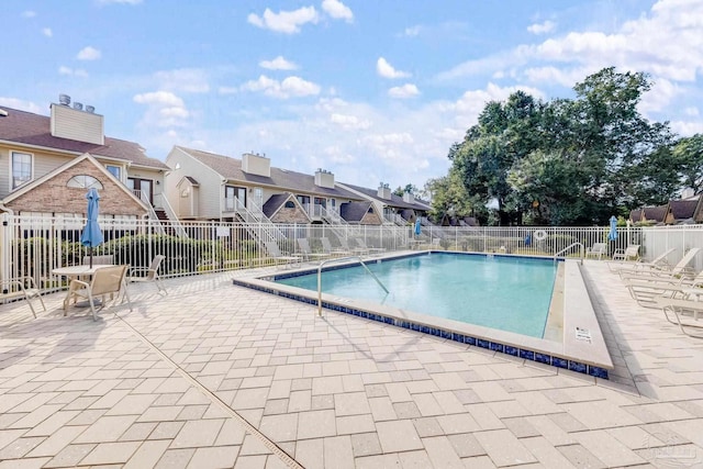 view of pool with a patio