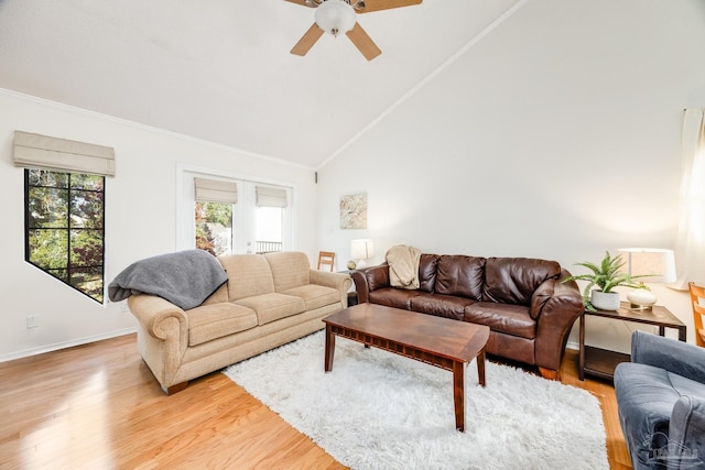 living room featuring ceiling fan, french doors, high vaulted ceiling, and light wood-type flooring