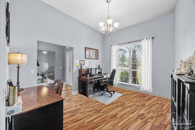 7951 Amethyst Dr, Pensacola, FL 32506 - home office featuring light wood-style flooring, a chandelier, and baseboards