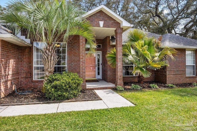 7951 Amethyst Dr, Pensacola, FL 32506 - property entrance featuring a yard and brick siding
