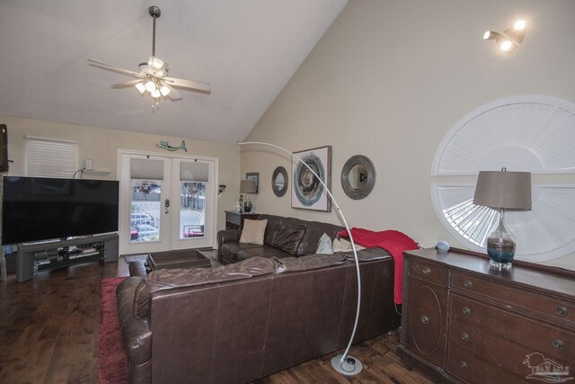 living room with high vaulted ceiling, dark wood-type flooring, ceiling fan, and french doors