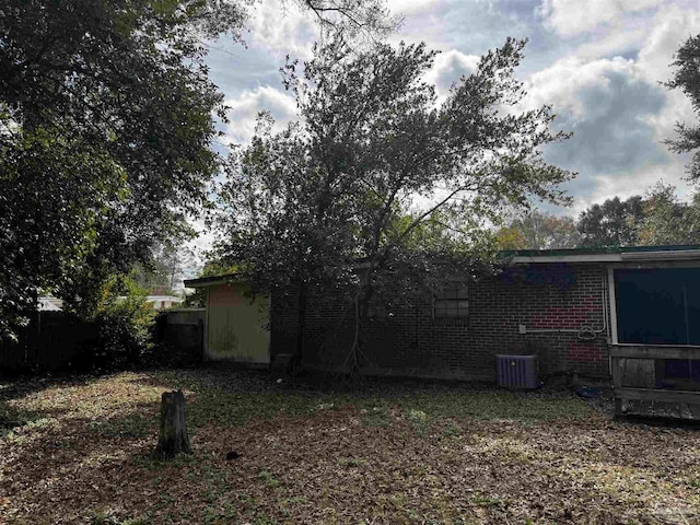 view of yard with central AC