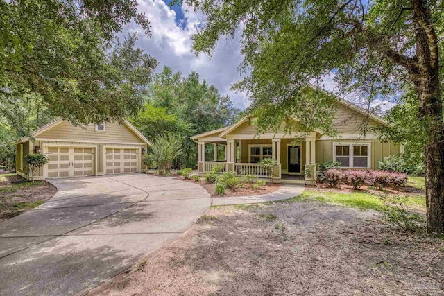 7515 Whiting Acres Ln, Milton, FL 32570 - view of front of home featuring a porch and a detached garage