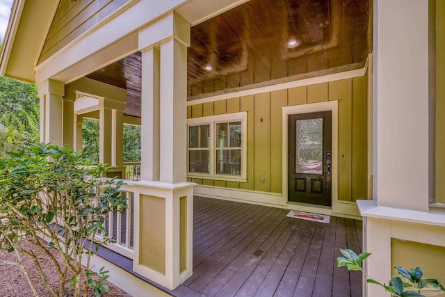 7515 Whiting Acres Ln, Milton, FL 32570 - view of exterior entry with covered porch and board and batten siding