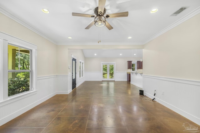 7515 Whiting Acres Ln, Milton, FL 32570 - unfurnished living room with a wainscoted wall, recessed lighting, a ceiling fan, ornamental molding, and french doors