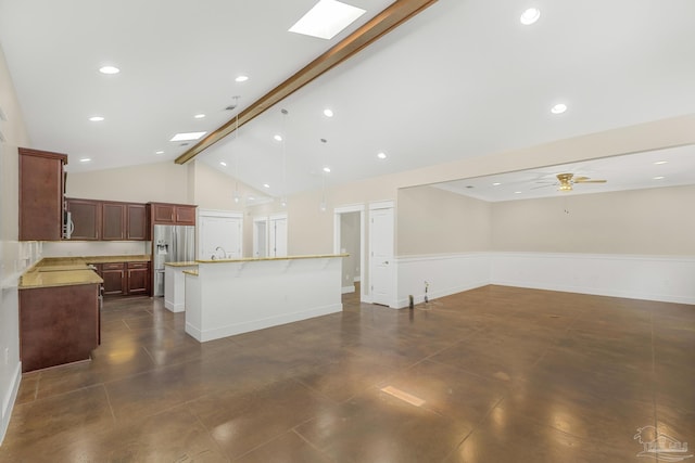 7515 Whiting Acres Ln, Milton, FL 32570 - unfurnished living room featuring recessed lighting, a ceiling fan, high vaulted ceiling, and a skylight
