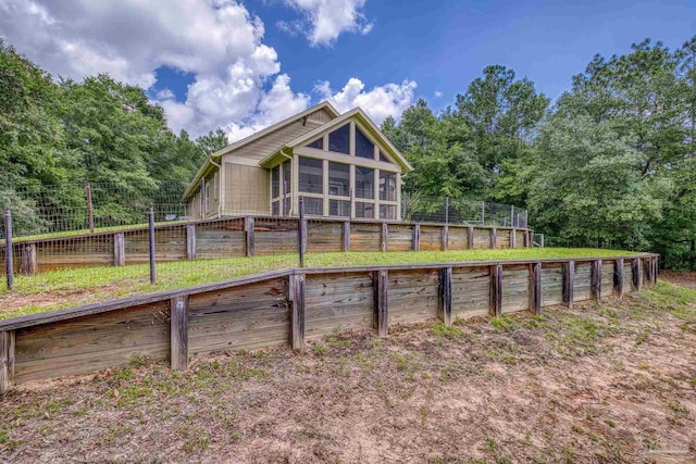 7515 Whiting Acres Ln, Milton, FL 32570 - back of house with a sunroom