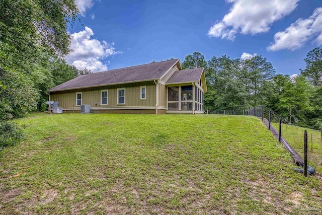 7515 Whiting Acres Ln, Milton, FL 32570 - back of property with a sunroom and board and batten siding