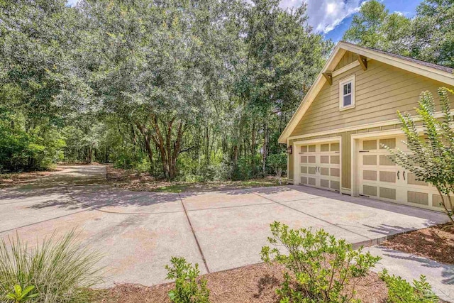 7515 Whiting Acres Ln, Milton, FL 32570 - view of patio / terrace featuring a detached garage