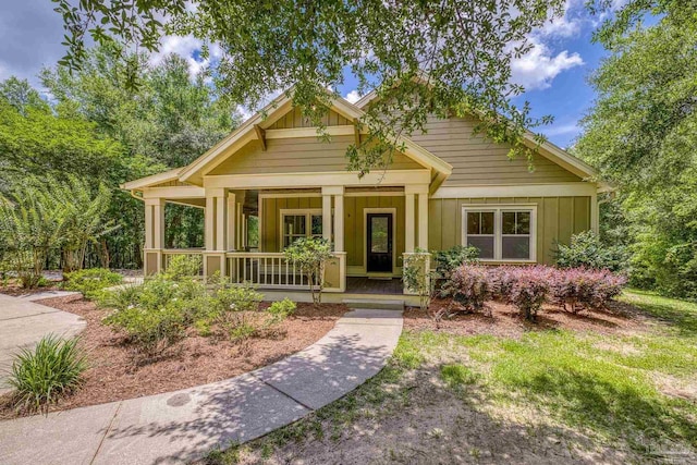 7515 Whiting Acres Ln, Milton, FL 32570 - craftsman inspired home with a porch and board and batten siding