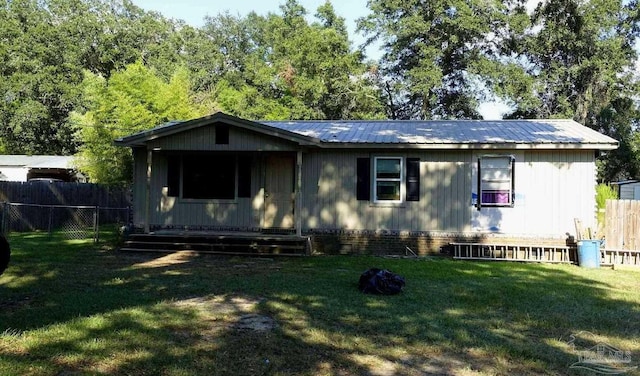 view of front of home with a front yard