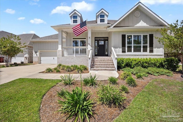 craftsman-style house featuring driveway, board and batten siding, a shingled roof, a porch, and a garage