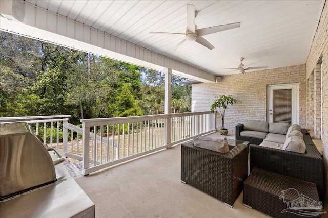 view of patio with a ceiling fan, outdoor lounge area, and area for grilling